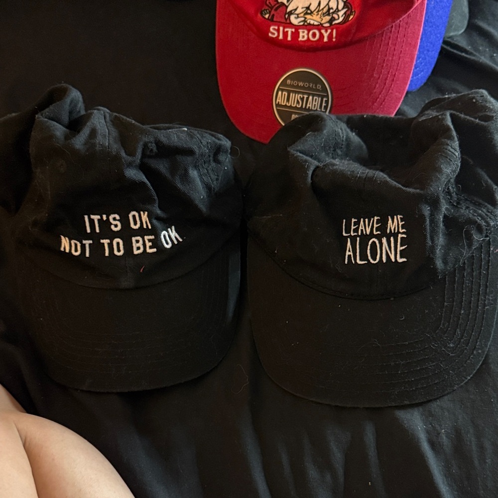 Black Caps with White Text